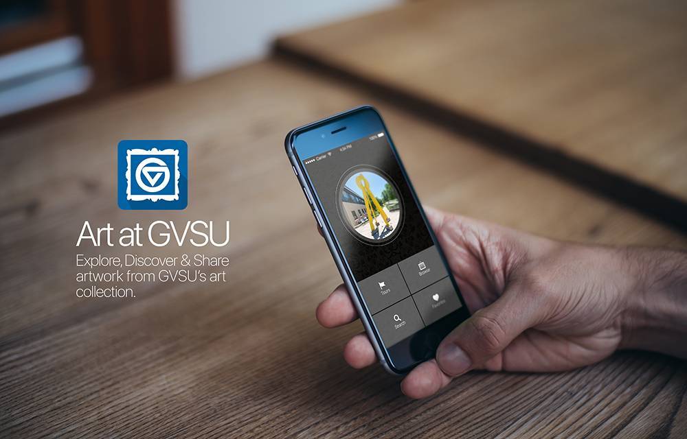 Photograph of a person holding a cellphone featuring the GVSU Art Museum, "Art at GVSU"